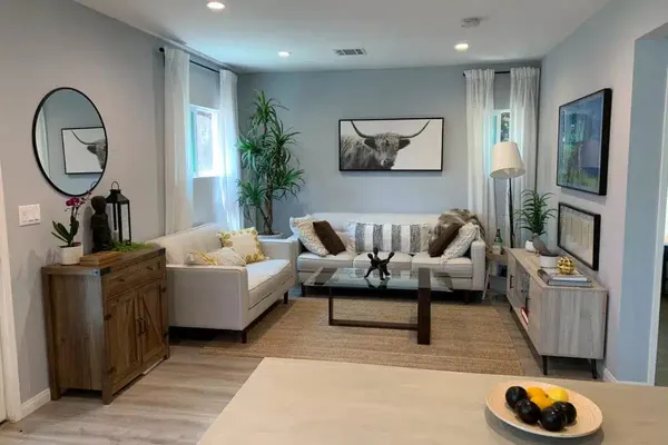 Finished garage-conversion ADU styled as a bright, comfortable living room