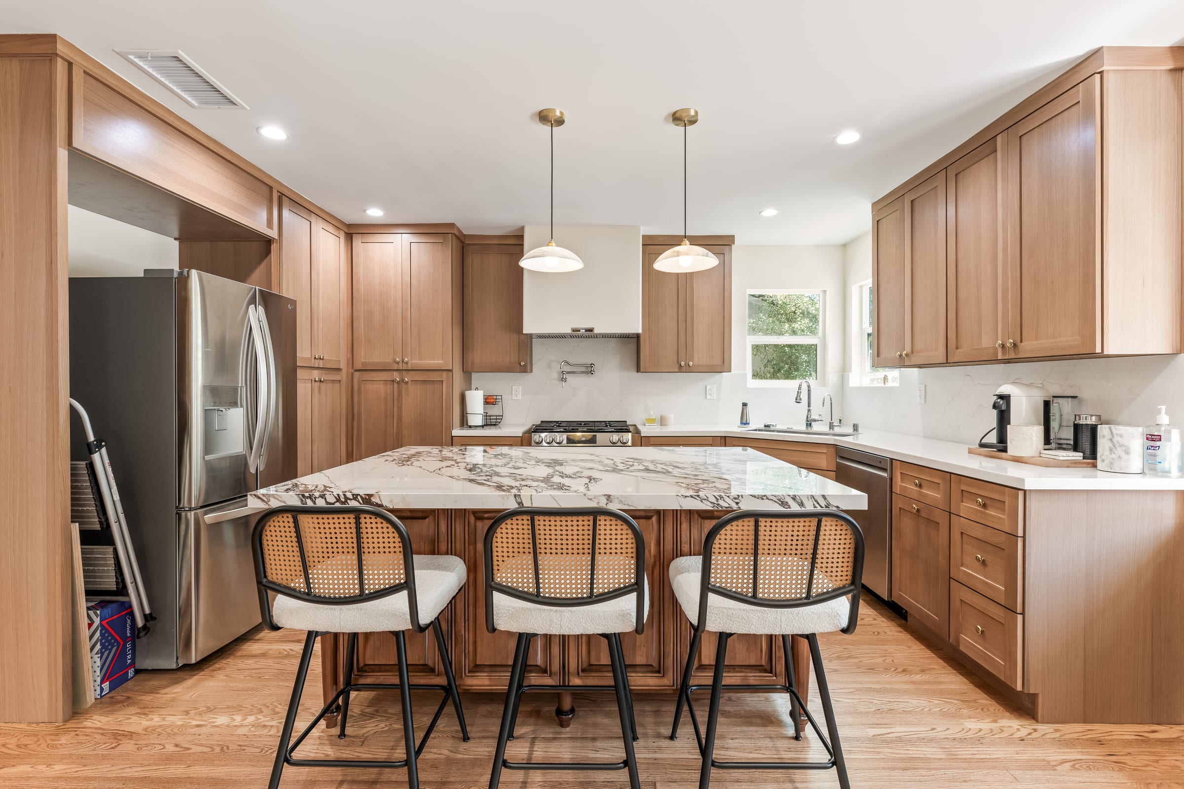 Warm Contemporary Kitchen Remodel by Preferred Home Builders project photo